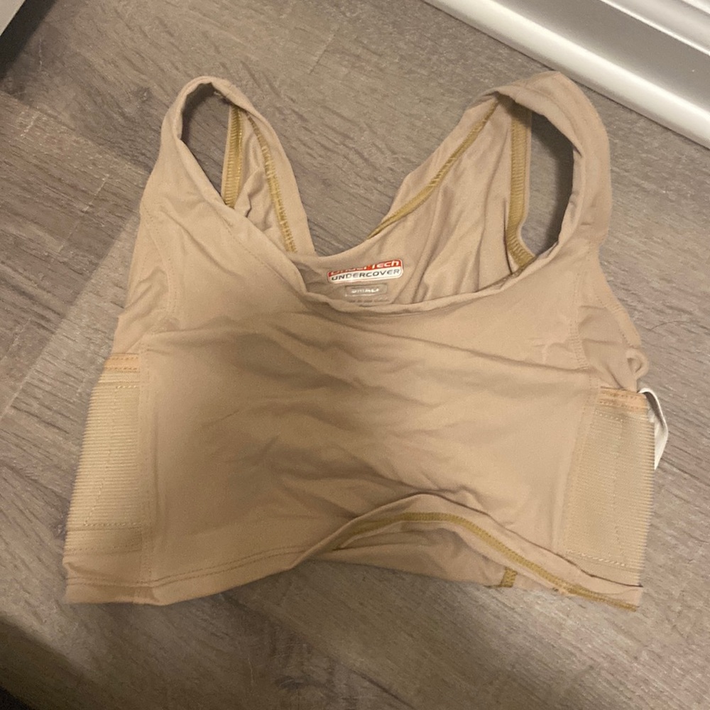 Tan under tech undercover size small holster. Like new. Never worn!!